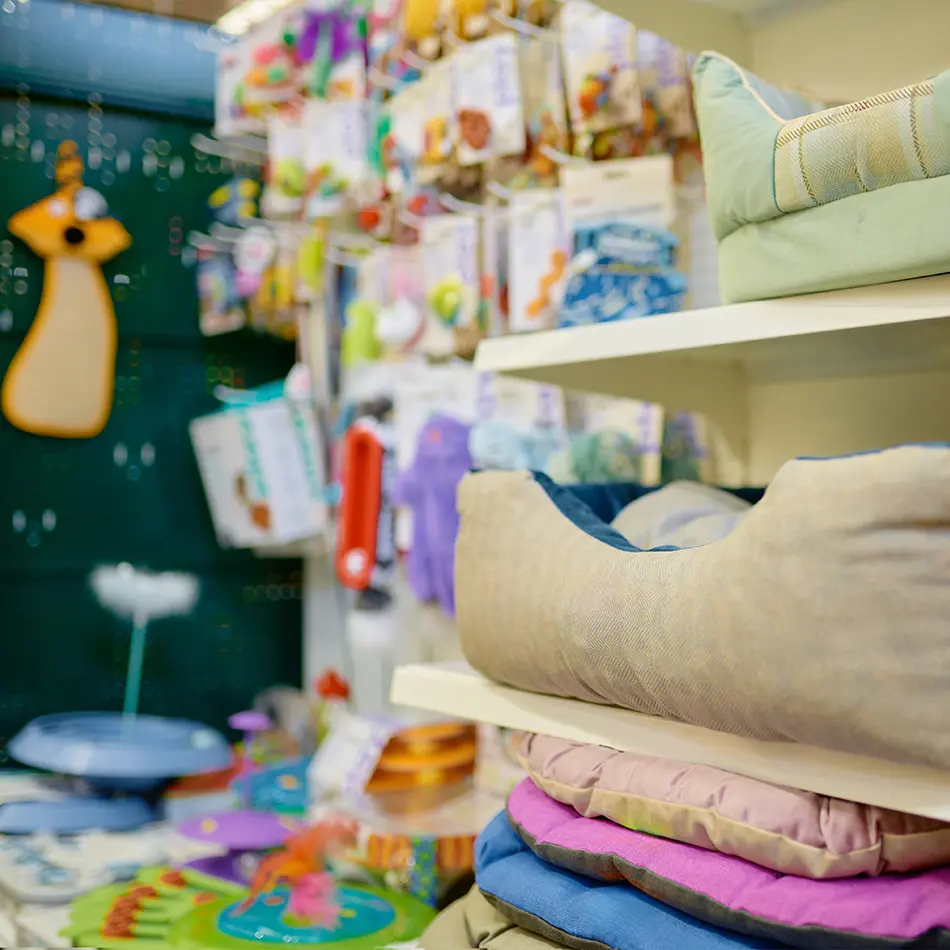 A shelf of pet accessories, pet sleeping place